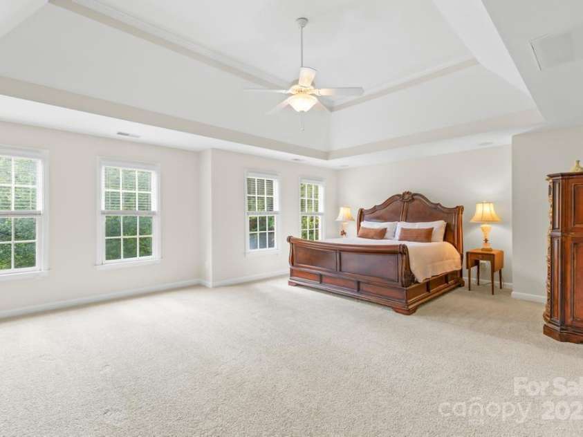 9311 St Barts Lane, Huntersville, NC 28078.  MLS# CAR4255582, YatesRealty ID 13449. Large gorgeous primary suite with trey ceiling and new carpet!