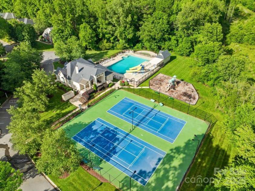 9311 St Barts Lane, Huntersville, NC 28078.  MLS# CAR4255582, YatesRealty ID 13449. One of two sets of Clubhouses and Pools/Tennis & Pickleball Courts and Playgrounds for the exclusives use of the 365 Hamptons residents only. This is the Doyers Pool & Clubhouse.