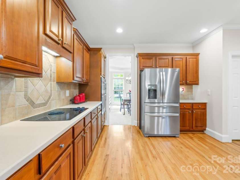 9311 St Barts Lane, Huntersville, NC 28078.  MLS# CAR4255582, YatesRealty ID 13449. Refrigerator conveys with home - large walk-in pantry
