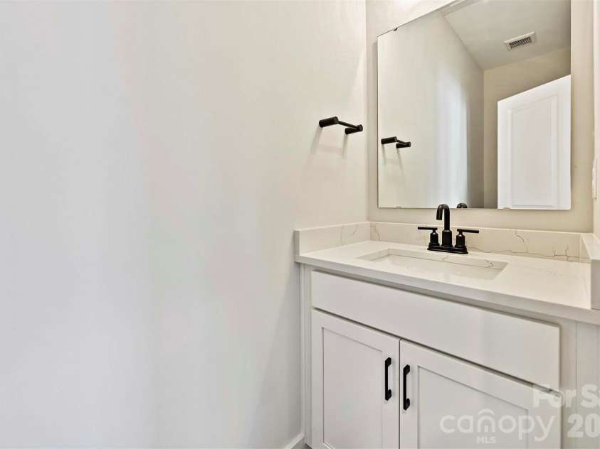 1227 34th Street, Charlotte, NC 28205.  MLS# CAR4211267, YatesRealty ID 1345. Rec room Powder Room
