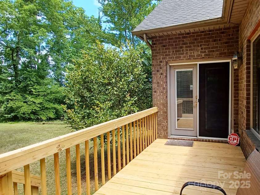 1061 14th Avenue Drive, Hickory, NC 28601.  MLS# CAR4257798, YatesRealty ID 13453. Back Deck Off Sun Room/Office