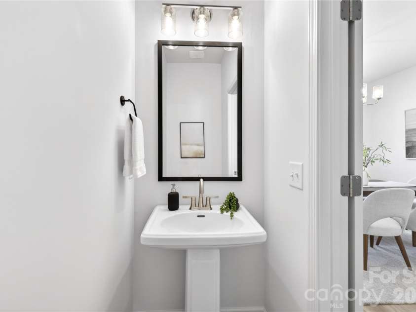4809 Eleanor Drive, Charlotte, NC 28208.  MLS# CAR4359149, YatesRealty ID 13453. Half Bathroom Main Level