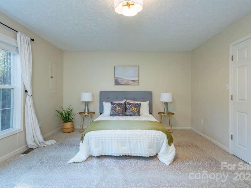 29 Beverly Grove Lane, Candler, NC 28715.  MLS# CAR4235867, YatesRealty ID 13455. Primary Bedroom on Main Floor