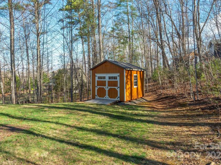 29 Beverly Grove Lane, Candler, NC 28715.  MLS# CAR4235867, YatesRealty ID 13455. Shed for storage or creative space