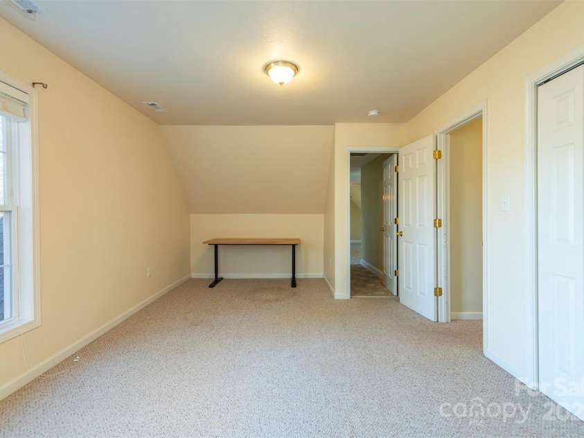 29 Beverly Grove Lane, Candler, NC 28715.  MLS# CAR4235867, YatesRealty ID 13455. Upstairs Bedroom