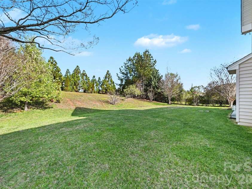 7512 Chasewater Drive, Harrisburg, NC 28075.  MLS# CAR4360354, YatesRealty ID 13455. Backyard