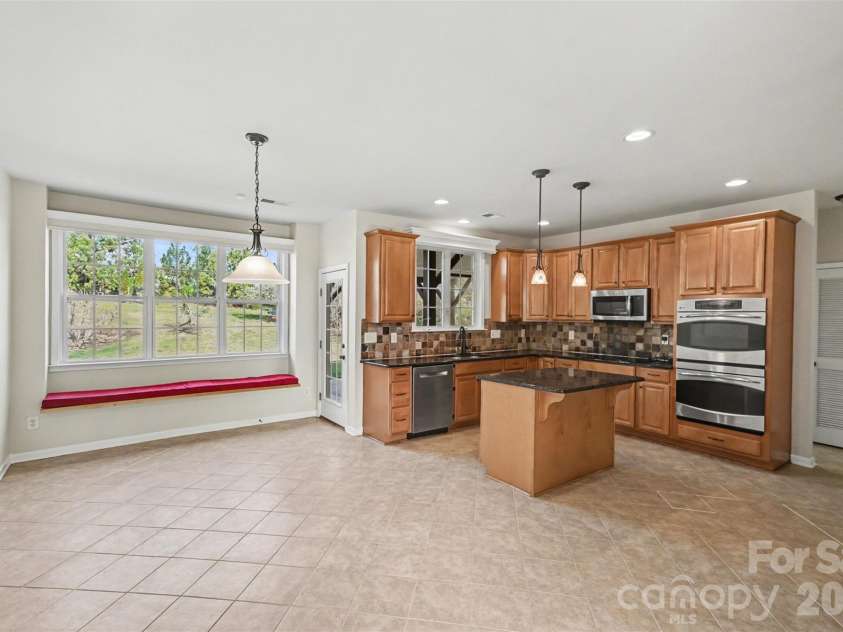 7512 Chasewater Drive, Harrisburg, NC 28075.  MLS# CAR4360354, YatesRealty ID 13455. Breakfast Area/Kitchen