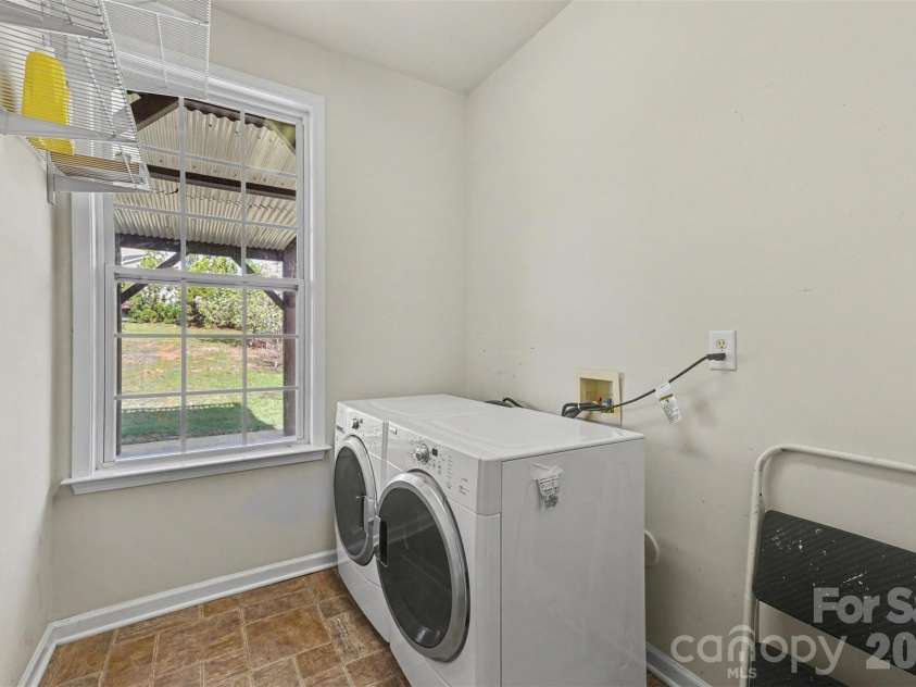 7512 Chasewater Drive, Harrisburg, NC 28075.  MLS# CAR4360354, YatesRealty ID 13455. Laundry Room