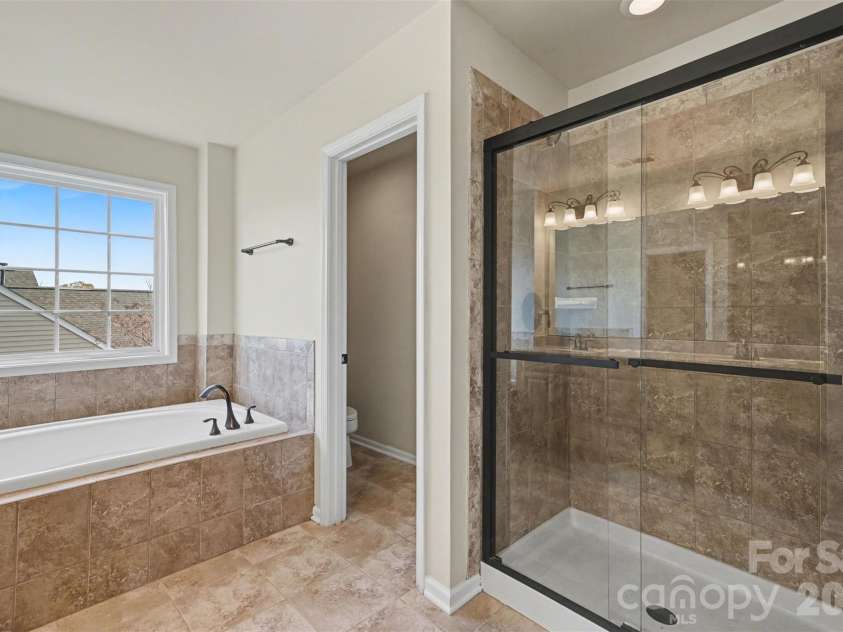 7512 Chasewater Drive, Harrisburg, NC 28075.  MLS# CAR4360354, YatesRealty ID 13455. Primary Bathroom