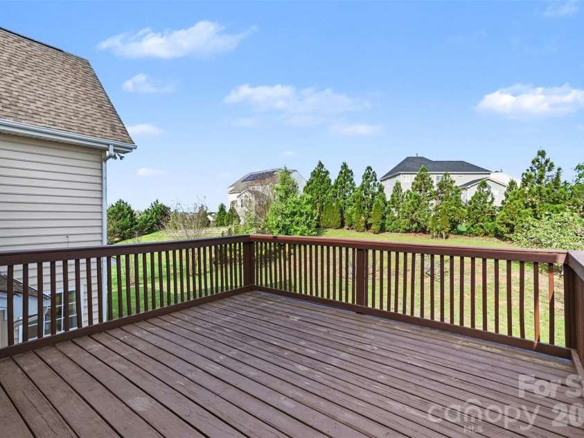 7512 Chasewater Drive, Harrisburg, NC 28075.  MLS# CAR4360354, YatesRealty ID 13455. Private Deck off Primary Bedroom