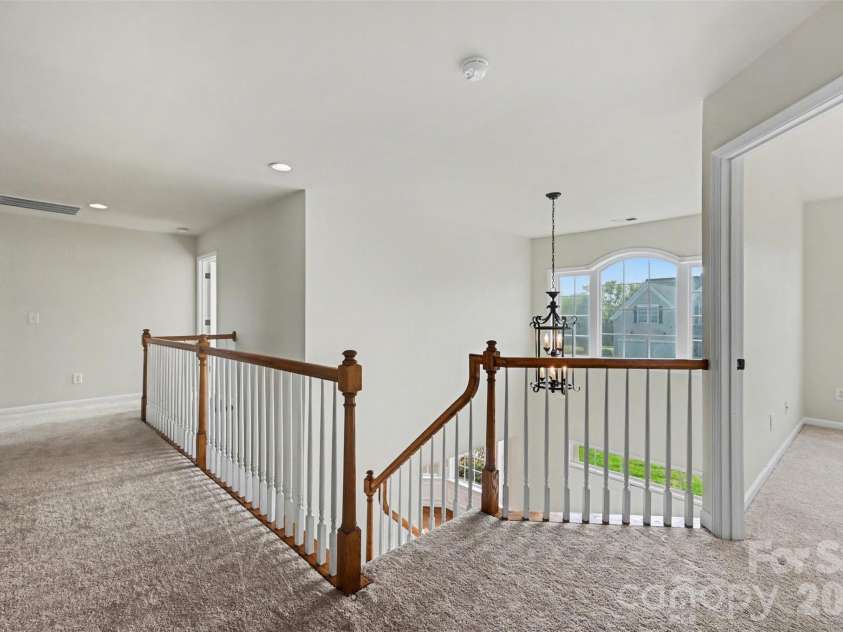 7512 Chasewater Drive, Harrisburg, NC 28075.  MLS# CAR4360354, YatesRealty ID 13455. Upstairs Landing