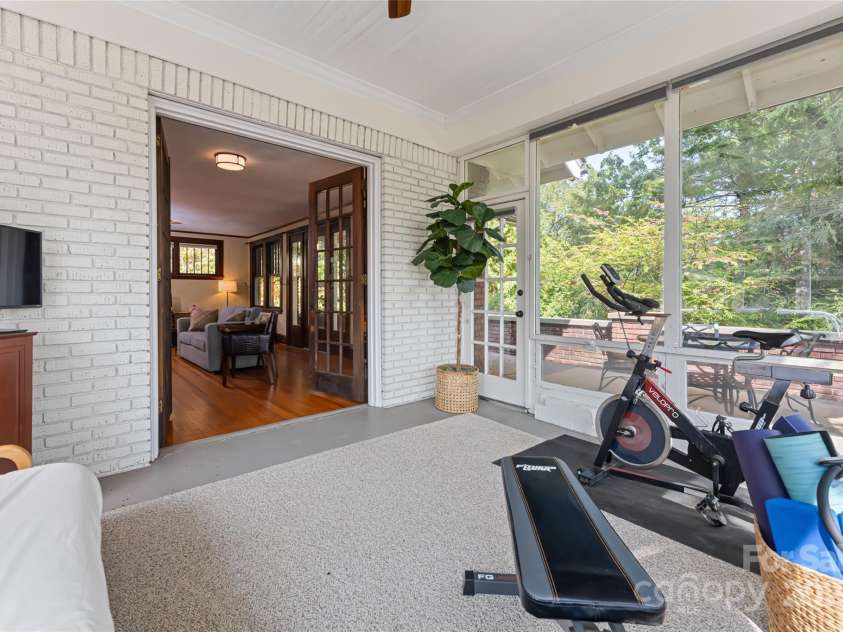56 Sherwood Road, Asheville, NC 28803.  MLS# CAR4180458, YatesRealty ID 13457. Sun Room/Workout Room