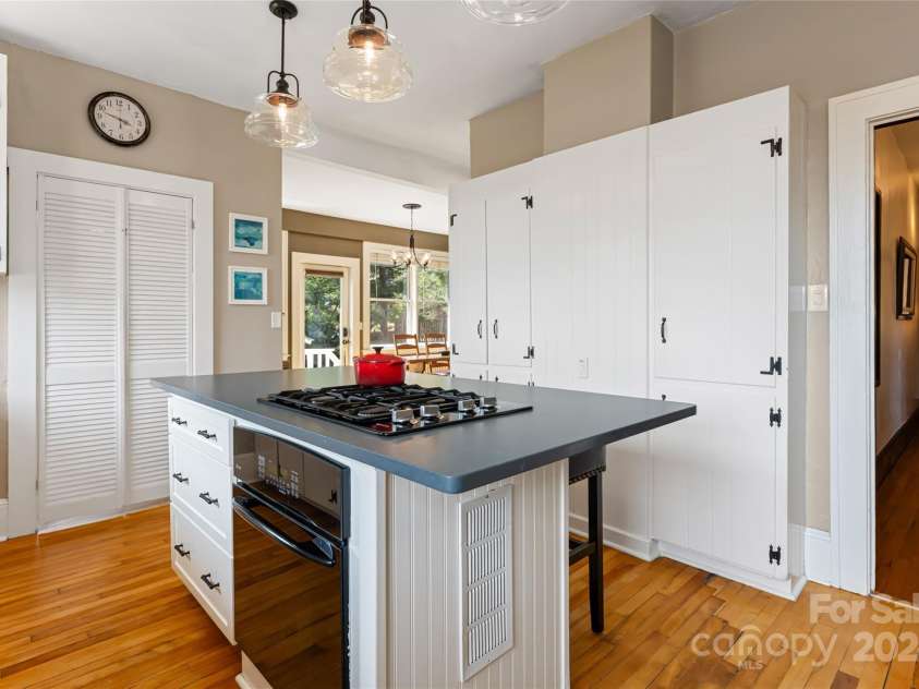 56 Sherwood Road, Asheville, NC 28803.  MLS# CAR4180458, YatesRealty ID 13457. Tons of Storage