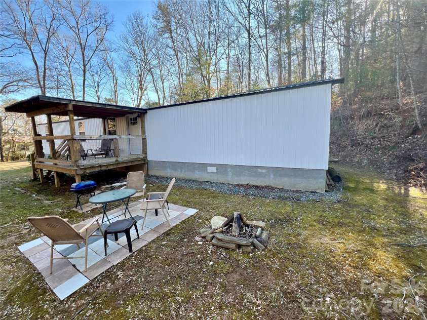 1019 Hudlin Gap Road, Pisgah Forest, NC 28768.  MLS# CAR4352720, YatesRealty ID 13458. Fire Pit