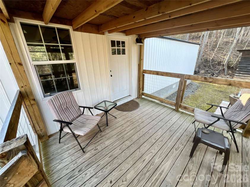 1019 Hudlin Gap Road, Pisgah Forest, NC 28768.  MLS# CAR4352720, YatesRealty ID 13458. Front Door