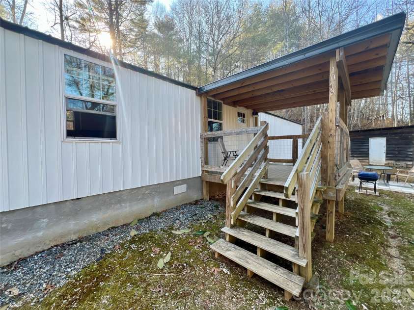 1019 Hudlin Gap Road, Pisgah Forest, NC 28768.  MLS# CAR4352720, YatesRealty ID 13458. Front Porch