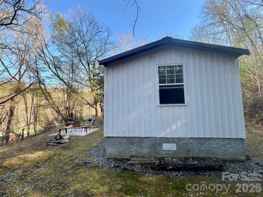 1019 Hudlin Gap Road, Pisgah Forest, NC 28768.  MLS# CAR4352720, YatesRealty ID 13458. Opposite Side Rear