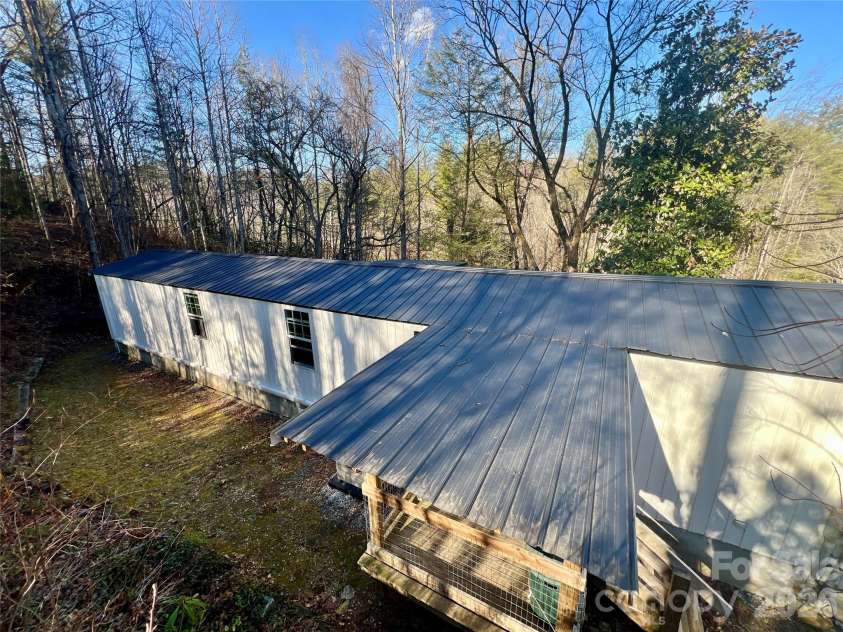 1019 Hudlin Gap Road, Pisgah Forest, NC 28768.  MLS# CAR4352720, YatesRealty ID 13458. Roof
