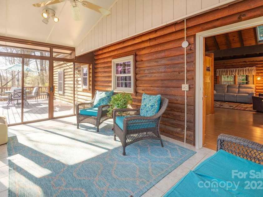 336 Winding Way Lane, Hendersonville, NC 28792.  MLS# CAR4202529, YatesRealty ID 13459. Enclosed Sunroom