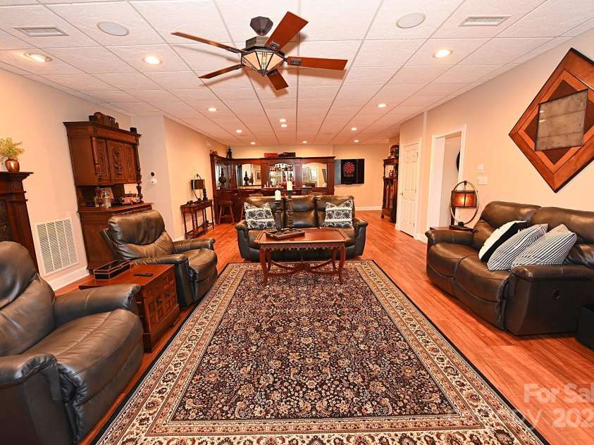 3996 Deer Run Drive, Conover, NC 28613.  MLS# CAR4300299, YatesRealty ID 1346. Lower level Family room