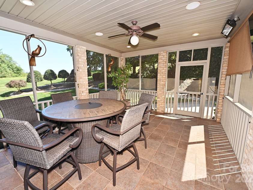3996 Deer Run Drive, Conover, NC 28613.  MLS# CAR4300299, YatesRealty ID 1346. Screen porch off Kitchen