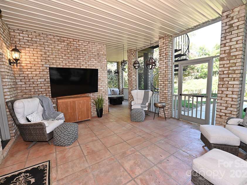 3996 Deer Run Drive, Conover, NC 28613.  MLS# CAR4300299, YatesRealty ID 1346. Screened patio- Lower level