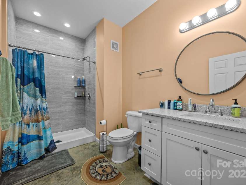 113 Burton Street, Asheville, NC 28806.  MLS# CAR4283610, YatesRealty ID 13460. Large bath in the ADU