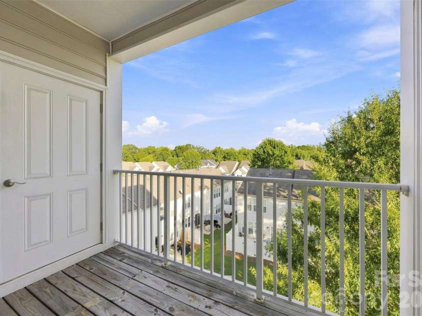 6605 Central Pacific Avenue, Charlotte, NC 28210.  MLS# CAR4423685, YatesRealty ID 13464. Covered balcony wtth storage closet, overlooking courtyard.