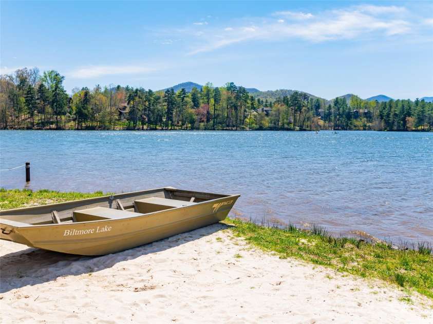 11 La Rue Court, Candler, NC 28715.  MLS# CAR4242161, YatesRealty ID 13467. And a spacious beach to enjoy swimming