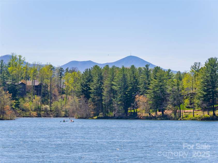 11 La Rue Court, Candler, NC 28715.  MLS# CAR4242161, YatesRealty ID 13467. Enjoy Lake access with kayaks and paddleboards
