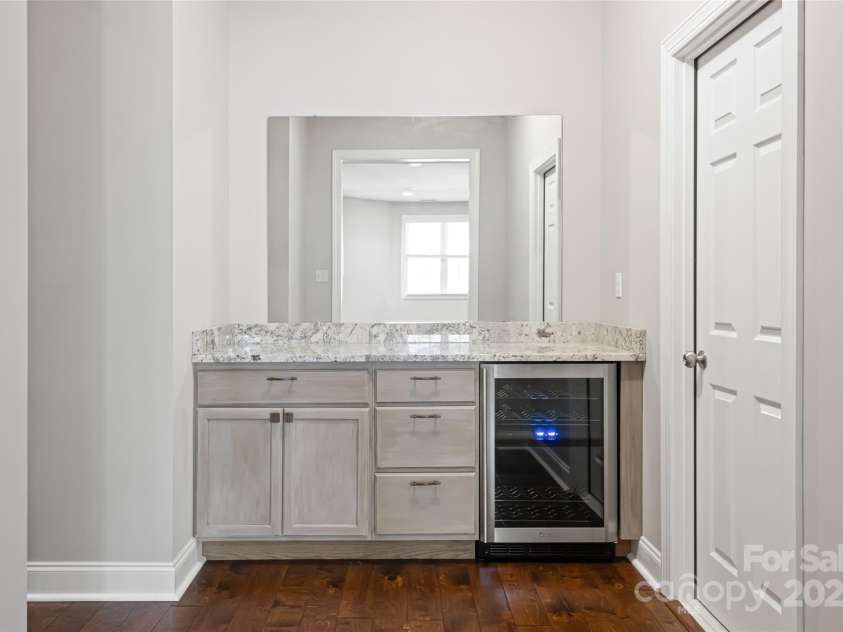 11 La Rue Court, Candler, NC 28715.  MLS# CAR4242161, YatesRealty ID 13467. Lower level bar perfect for entertaining or for hosting house guests in style