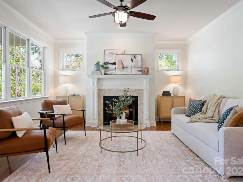 11 La Rue Court, Candler, NC 28715.  MLS# CAR4242161, YatesRealty ID 13467. Open family room that flows into the kitchen and large back deck