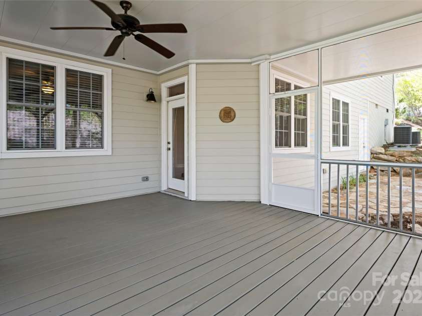 11 La Rue Court, Candler, NC 28715.  MLS# CAR4242161, YatesRealty ID 13467. The lower covered screened in porch provides additional space to enjoy our Carolina weather