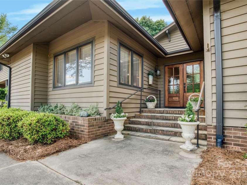 10315 Washam Potts Road, Cornelius, NC 28031.  MLS# CAR4243746, YatesRealty ID 13468. 