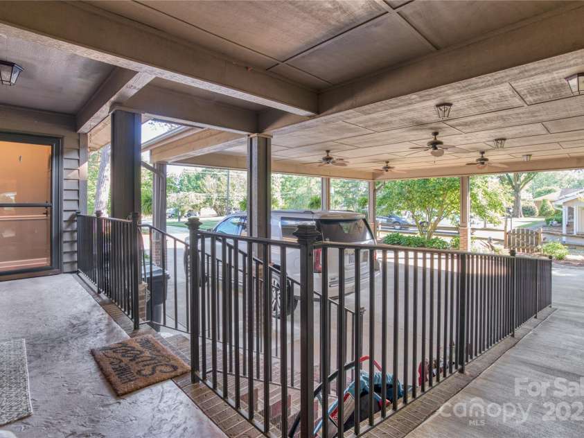 10315 Washam Potts Road, Cornelius, NC 28031.  MLS# CAR4243746, YatesRealty ID 13468. Breezeway with ramp