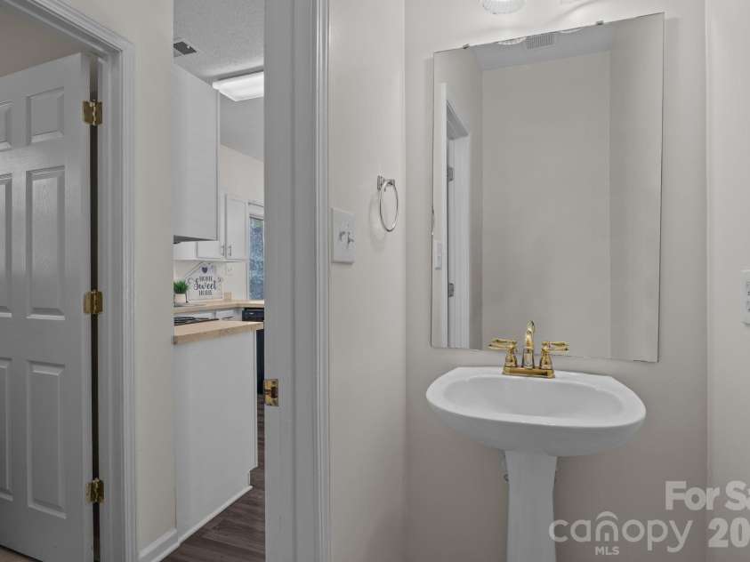 9201 Rotherham Lane, Charlotte, NC 28216.  MLS# CAR4316526, YatesRealty ID 13468. Guest bathroom