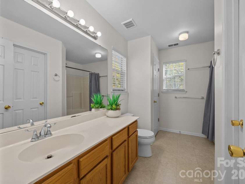 9201 Rotherham Lane, Charlotte, NC 28216.  MLS# CAR4316526, YatesRealty ID 13468. Primary bathroom
