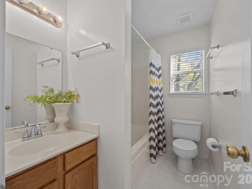 9201 Rotherham Lane, Charlotte, NC 28216.  MLS# CAR4316526, YatesRealty ID 13468. Secondary bathroom
