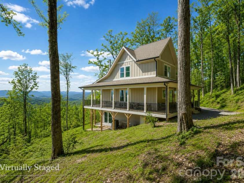 2280 Pinnacle Parkway, Union Mills, NC 28167.  MLS# CAR4363035, YatesRealty ID 13469. Virtually staged to show potential summer landscape