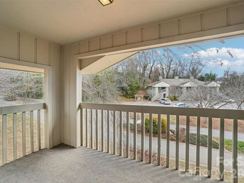 602 Abbey Circle, Asheville, NC 28805.  MLS# CAR4336699, YatesRealty ID 13477. Back balcony