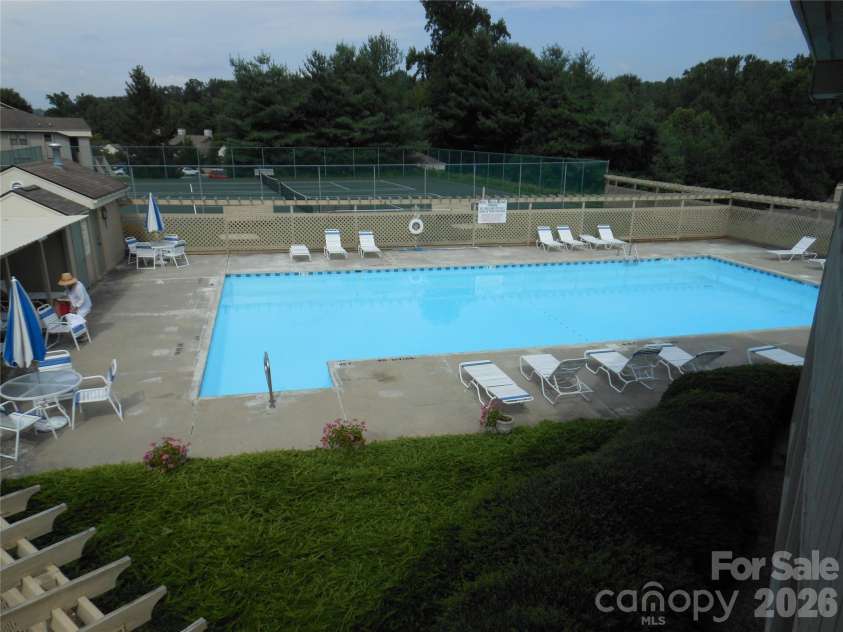 602 Abbey Circle, Asheville, NC 28805.  MLS# CAR4336699, YatesRealty ID 13477. Pool in the summertime!