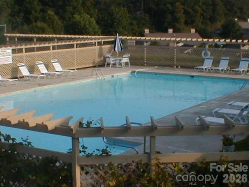 602 Abbey Circle, Asheville, NC 28805.  MLS# CAR4336699, YatesRealty ID 13477. Pool in the summertime!
