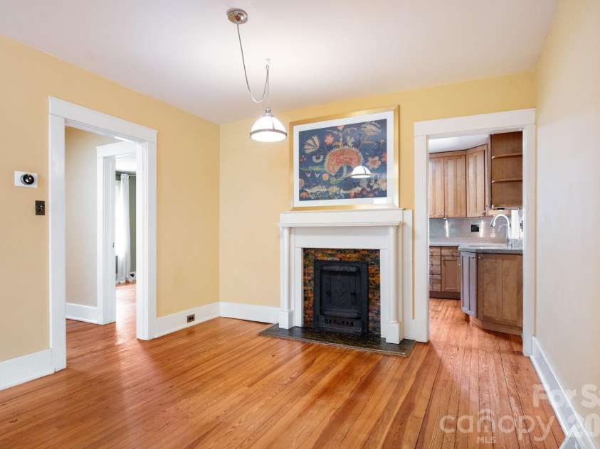 30 Monroe Place, Asheville, NC 28801.  MLS# CAR4366107, YatesRealty ID 13481. Beautiful Original Fireplace No Longer In Use