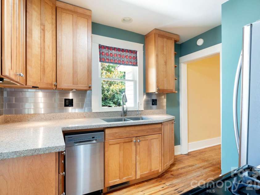 30 Monroe Place, Asheville, NC 28801.  MLS# CAR4366107, YatesRealty ID 13481. Efficient and Quaint Kitchen