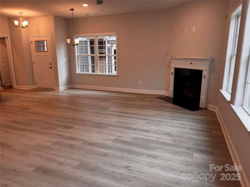 4069 Port Richmond Avenue, Gastonia, NC 28056.  MLS# CAR4185741, YatesRealty ID 13483. Living room facing towards entry door.