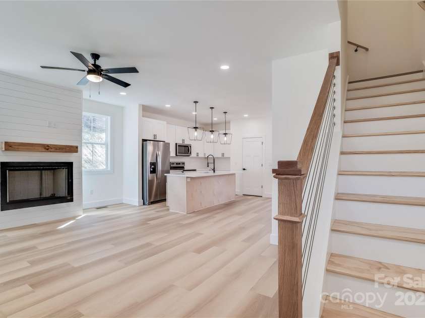 7 Jetts Ridge Drive, Swannanoa, NC 28778.  MLS# CAR4222038, YatesRealty ID 13487. Stairs are off the living room