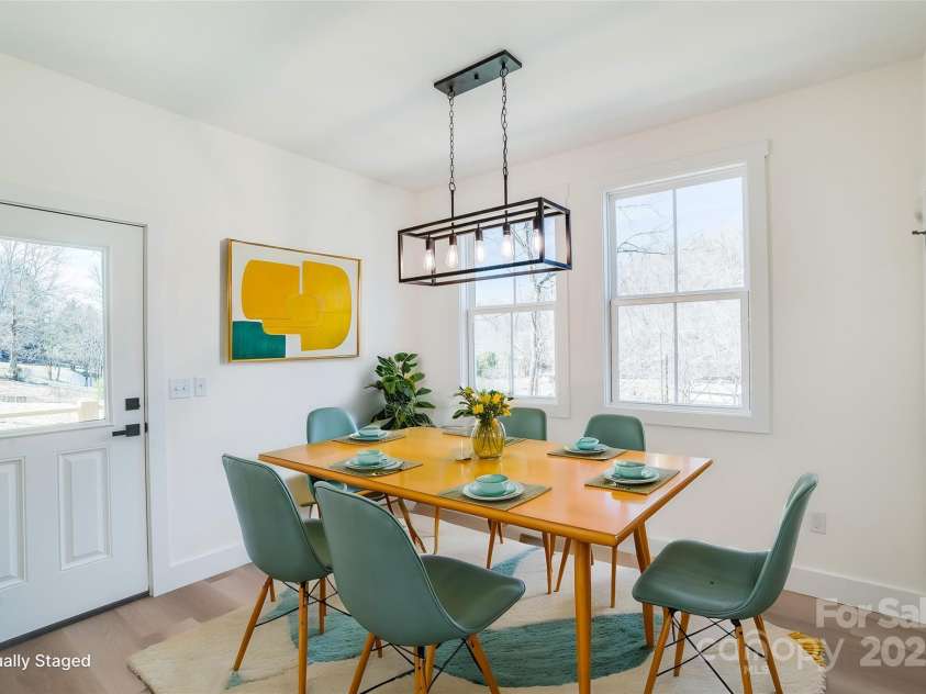 7 Jetts Ridge Drive, Swannanoa, NC 28778.  MLS# CAR4222038, YatesRealty ID 13487. Virtually staged dining room.