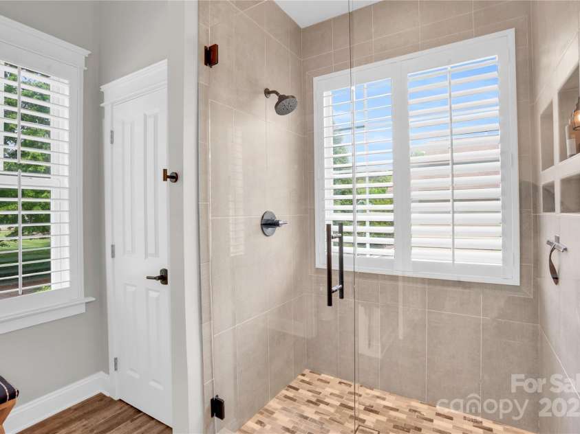 7814 Knox Ridge Road, Huntersville, NC 28078.  MLS# CAR4252077, YatesRealty ID 13488. Sleek glass shower