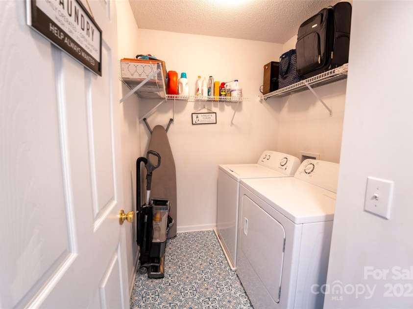 3412 Summerfield Ridge Lane, Matthews, NC 28105.  MLS# CAR4252402, YatesRealty ID 13489. Laundry room on upper
