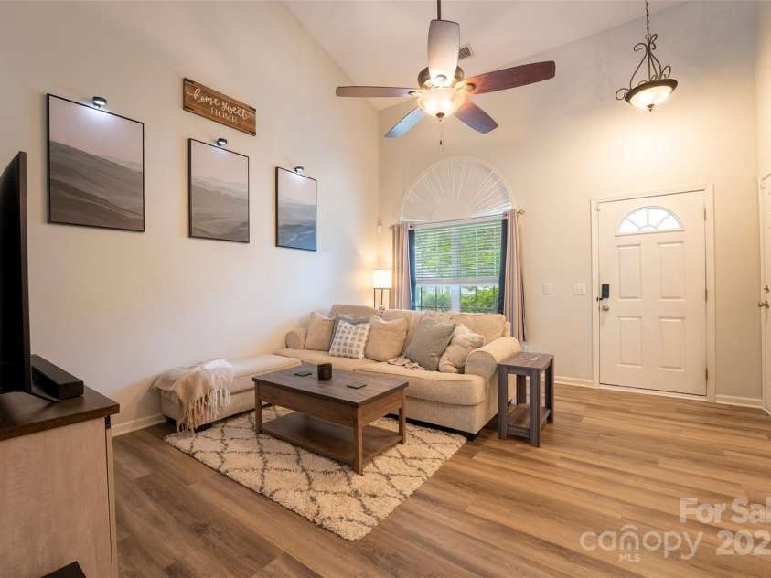 3412 Summerfield Ridge Lane, Matthews, NC 28105.  MLS# CAR4252402, YatesRealty ID 13489. Upgraded flooring throughout the main level